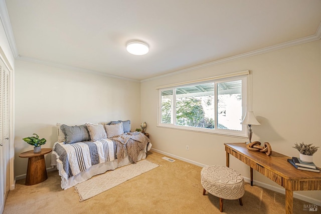 carpeted bedroom featuring crown molding