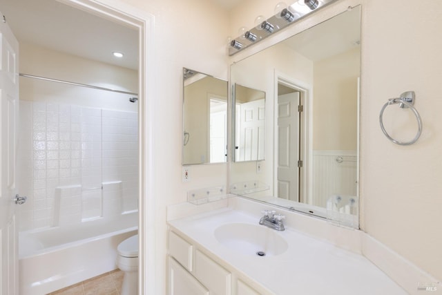 full bathroom with shower / tub combination, tile patterned flooring, vanity, and toilet