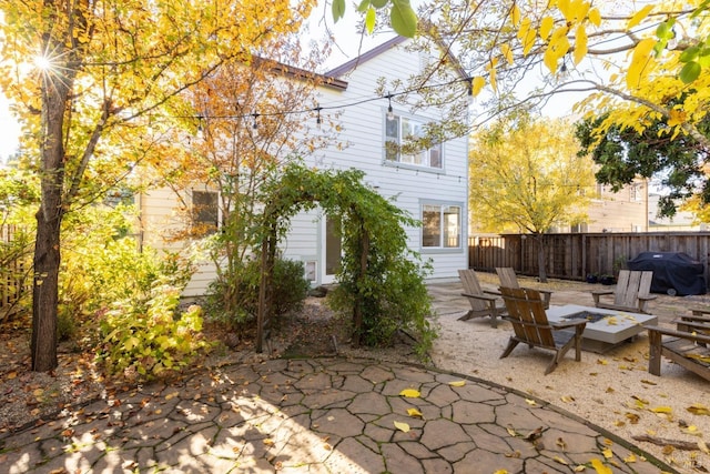 view of patio with grilling area and an outdoor fire pit