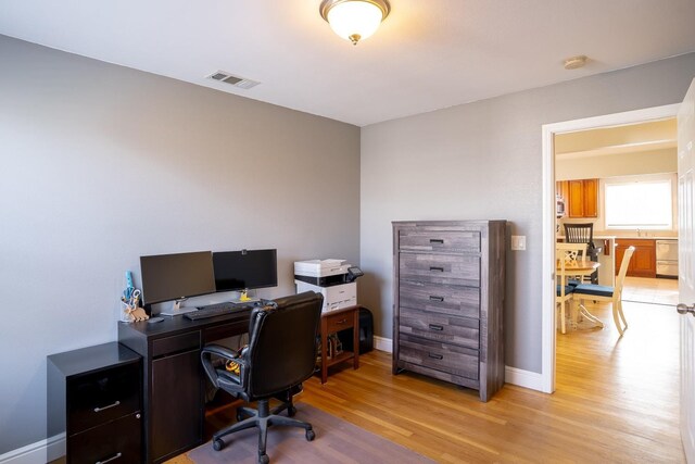 office featuring light hardwood / wood-style flooring