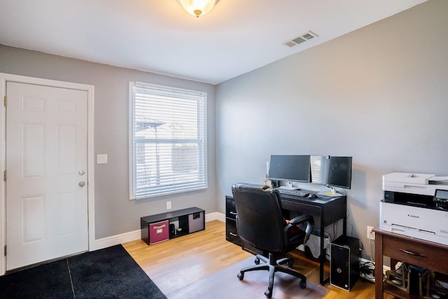 home office with light wood-type flooring