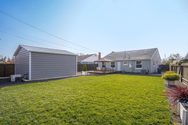 rear view of house featuring a deck