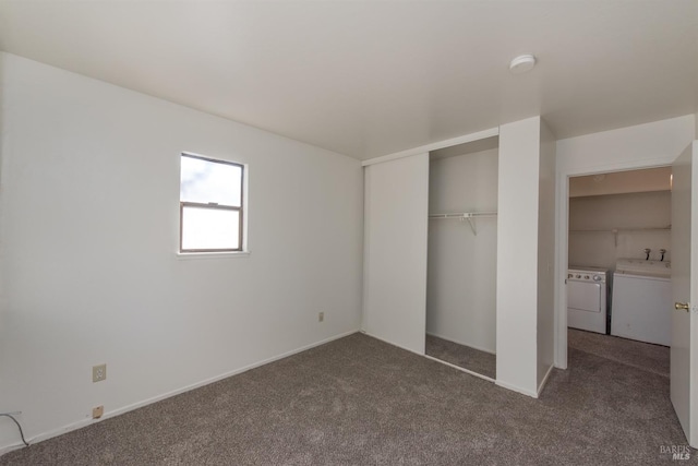 unfurnished bedroom with carpet floors, washing machine and clothes dryer, and a closet