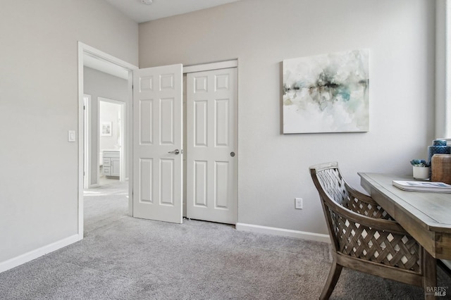 home office featuring light colored carpet