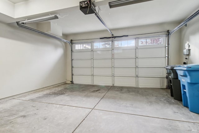 garage featuring a garage door opener