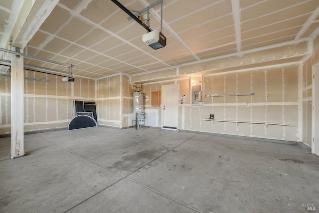 garage featuring a garage door opener, electric panel, and water heater