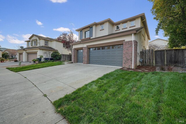 front facade with a front yard and a garage