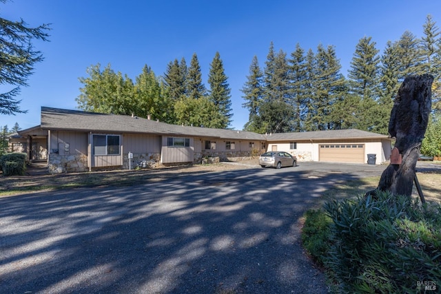 single story home featuring a garage