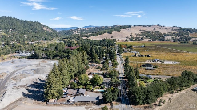 bird's eye view featuring a mountain view and a rural view