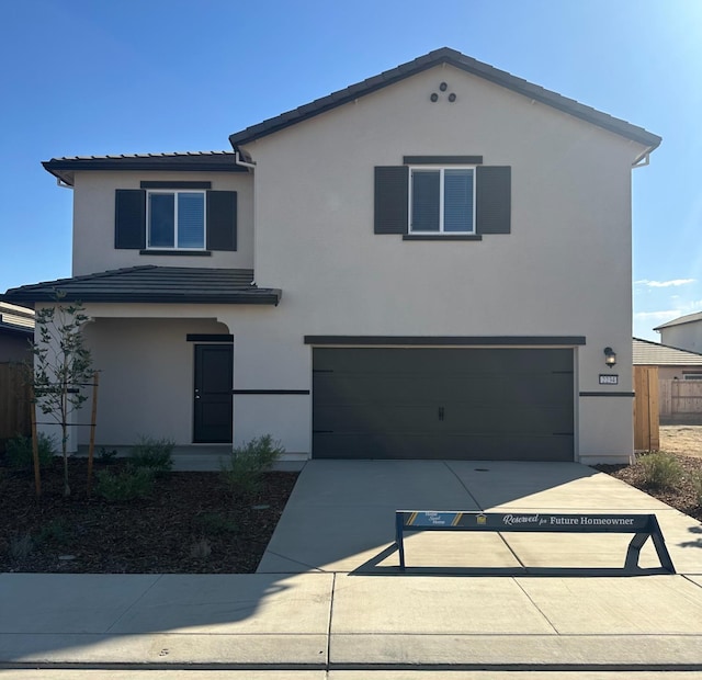 view of front of property with a garage