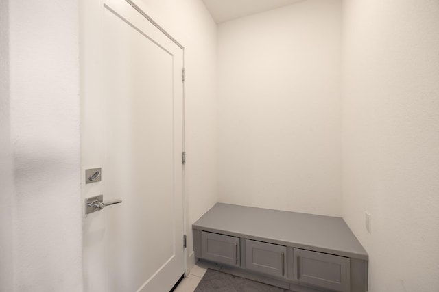 mudroom with light tile patterned floors