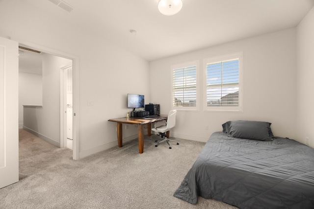 bedroom featuring baseboards, visible vents, and carpet