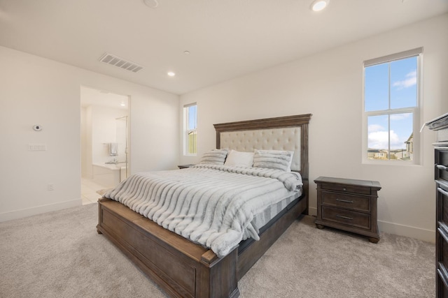bedroom featuring light colored carpet, baseboards, visible vents, and recessed lighting