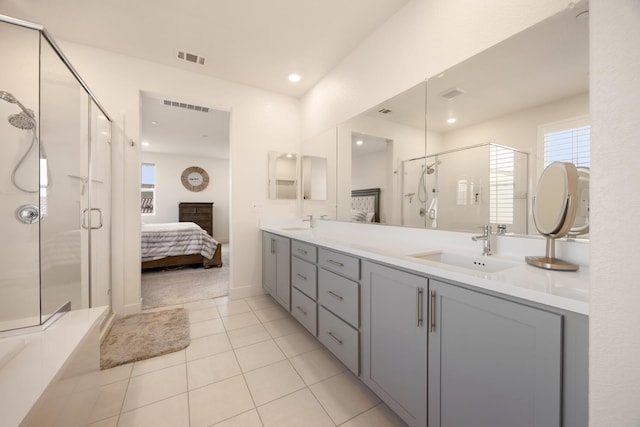 ensuite bathroom featuring ensuite bath, a sink, visible vents, and a stall shower
