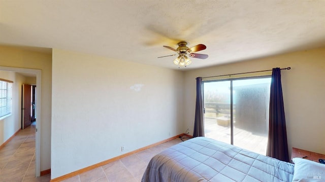 bedroom with access to exterior and ceiling fan