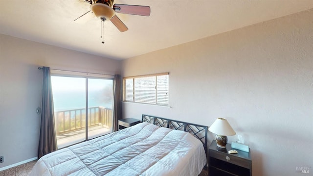 bedroom with access to exterior, ceiling fan, and carpet