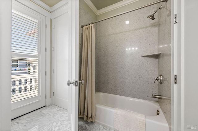 bathroom with crown molding and shower / bath combo