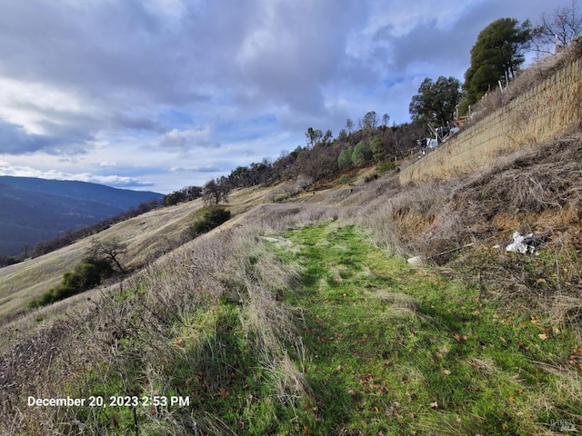 property view of mountains featuring a rural view