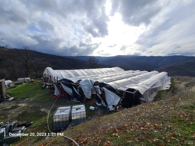 exterior space featuring a mountain view