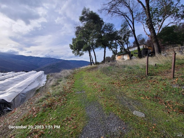 exterior space featuring a mountain view