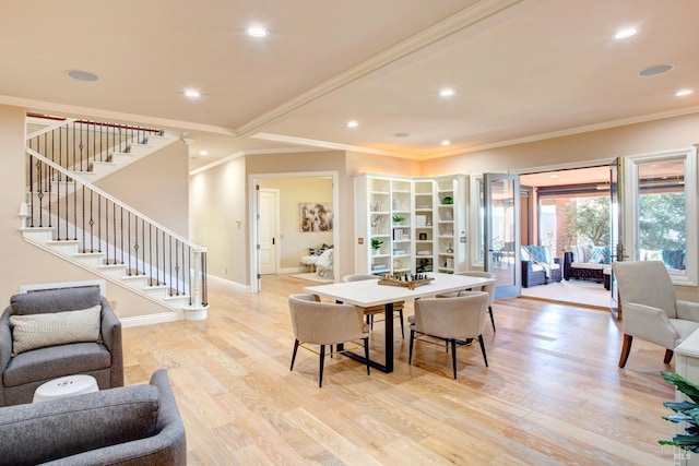 dining room featuring baseboards, stairway, crown molding, light wood-type flooring, and recessed lighting