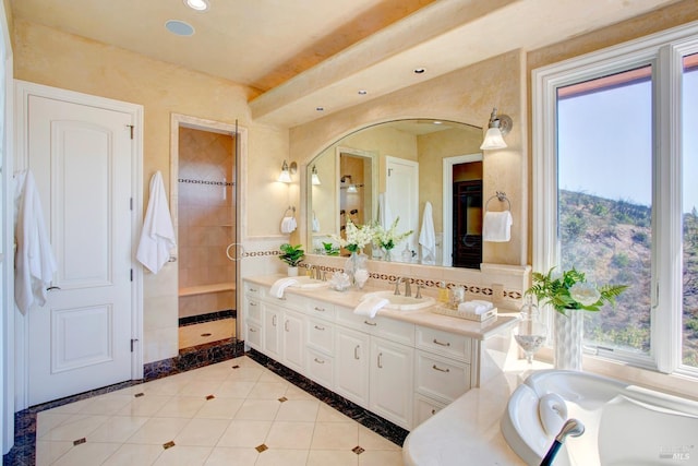 full bathroom featuring double vanity, tile patterned floors, a garden tub, a sink, and recessed lighting