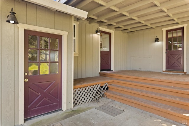 doorway to property with a porch