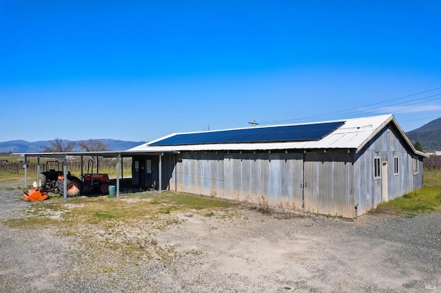 exterior space with a mountain view