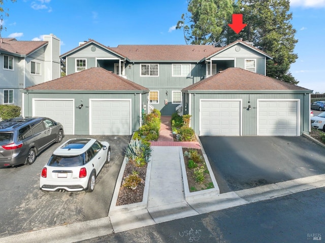 view of front of property with a garage