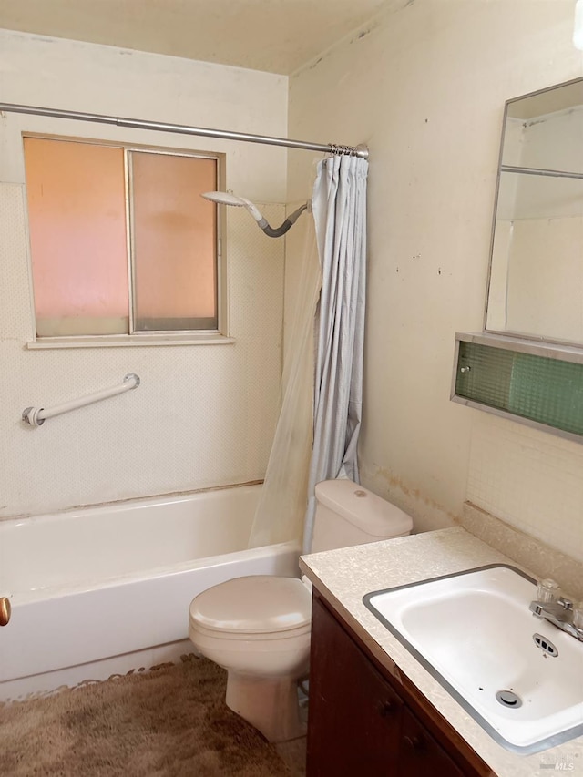 full bathroom with shower / bath combo, toilet, and vanity