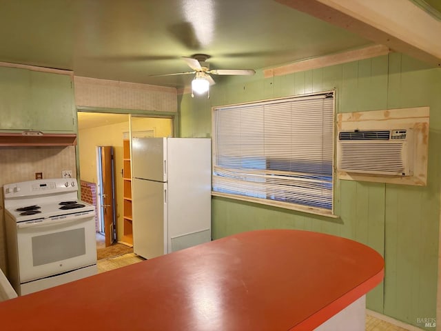 kitchen featuring a wall mounted air conditioner, white appliances, ceiling fan, and wood walls