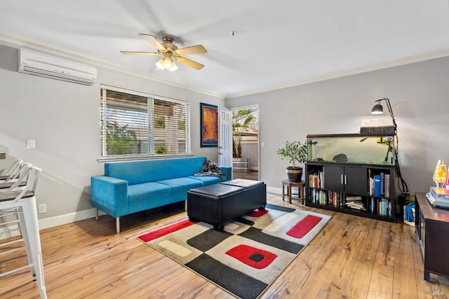 living room with hardwood / wood-style flooring, ceiling fan, ornamental molding, and a wall unit AC