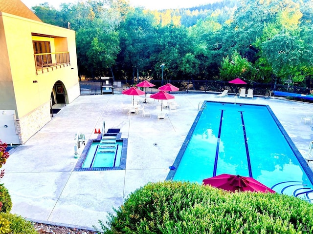 view of pool with a patio