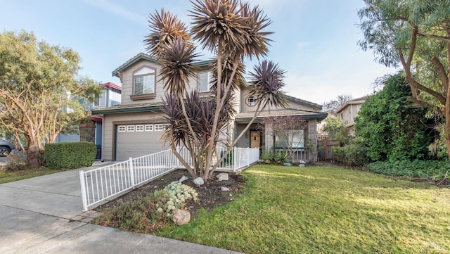 view of front of property featuring a front yard and a garage