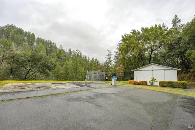 view of street featuring driveway