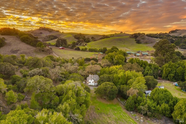 aerial view at dusk with a mountain view