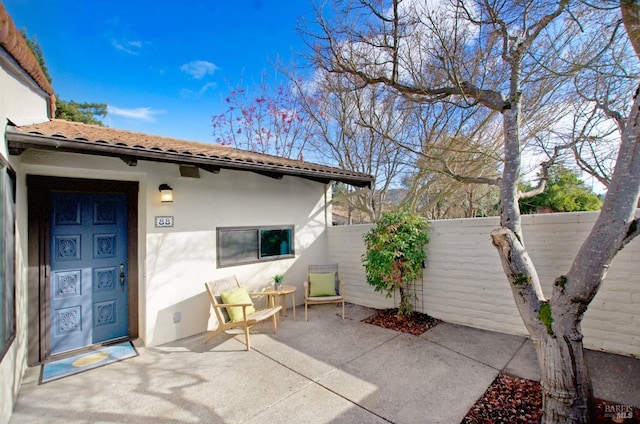 view of patio / terrace with fence