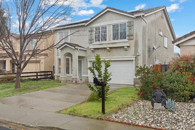 view of front of home with a garage