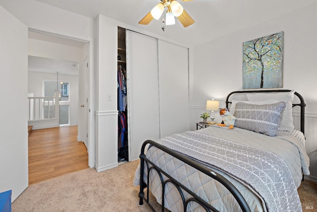 bedroom featuring a closet, hardwood / wood-style flooring, and ceiling fan