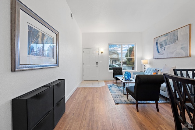 foyer entrance with hardwood / wood-style flooring