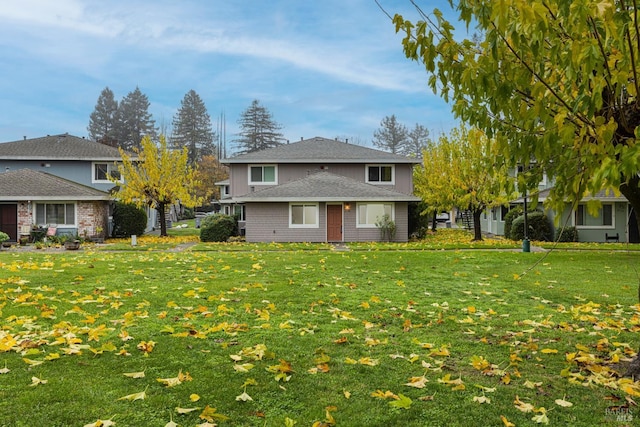 exterior space featuring a lawn