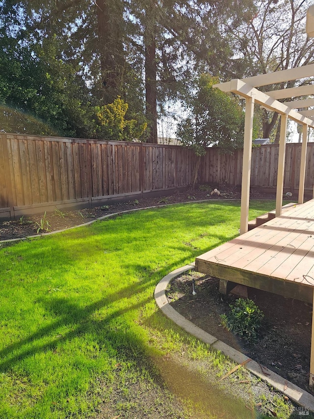 view of yard with a deck