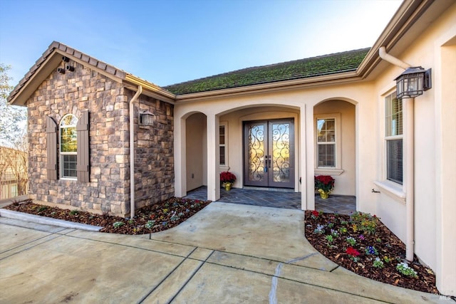 doorway to property featuring french doors