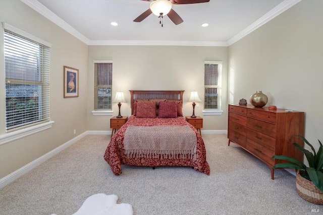 bedroom with light colored carpet, ceiling fan, and ornamental molding