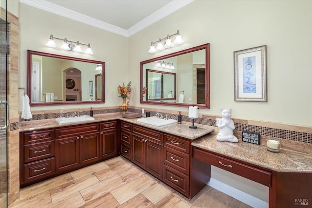 bathroom featuring decorative backsplash, vanity, and ornamental molding