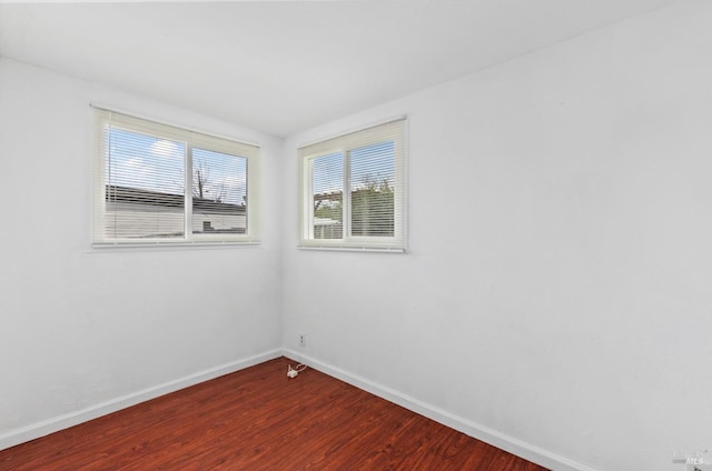 unfurnished room featuring wood-type flooring