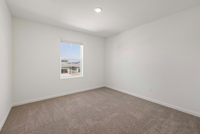 empty room featuring carpet