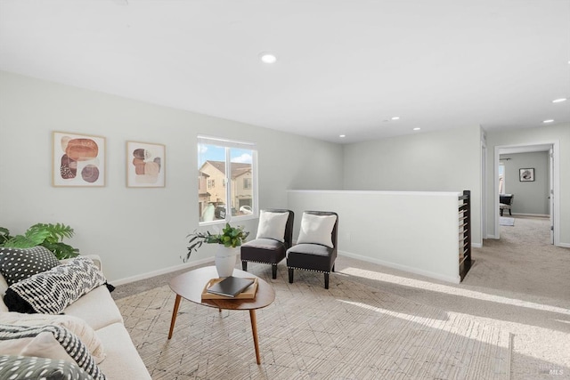 carpeted living room featuring recessed lighting and baseboards