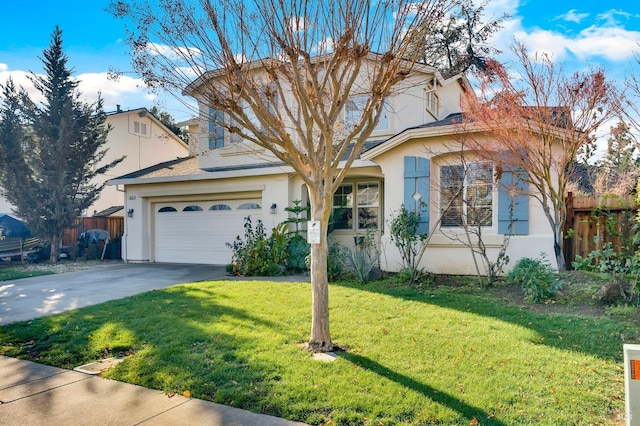 view of front of house featuring a front yard and a garage