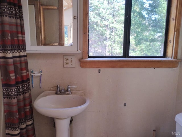 bathroom featuring toilet